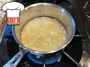 a sauce pan with hot melted butter