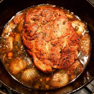 photo of beautifully cooked chasu pork for Japanese ramen in a cast iron Dutch oven