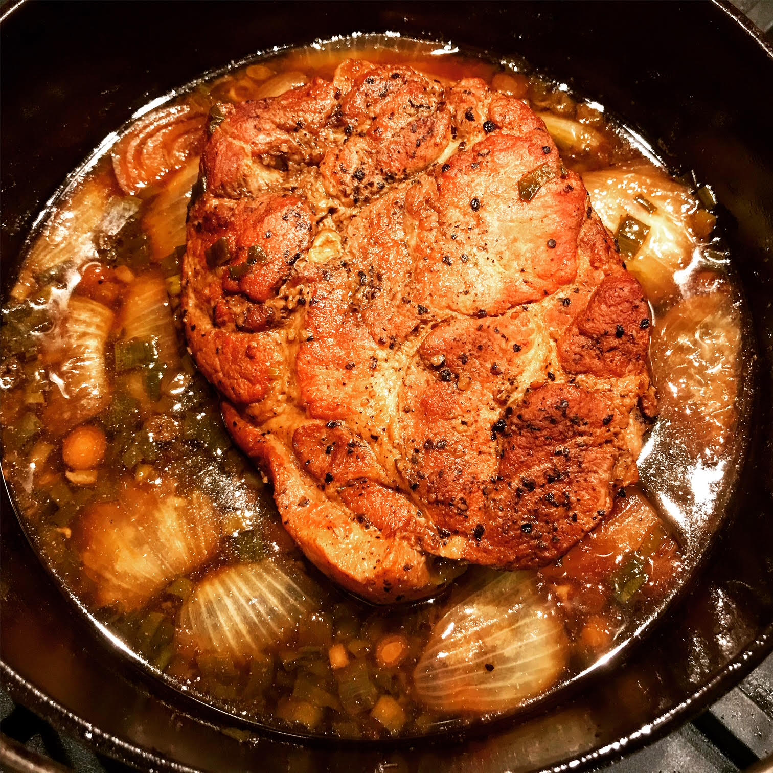 photo of beautifully cooked chasu pork for Japanese ramen in a cast iron Dutch oven