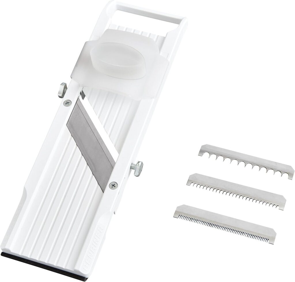 Mandoline with accessory cutter blades
