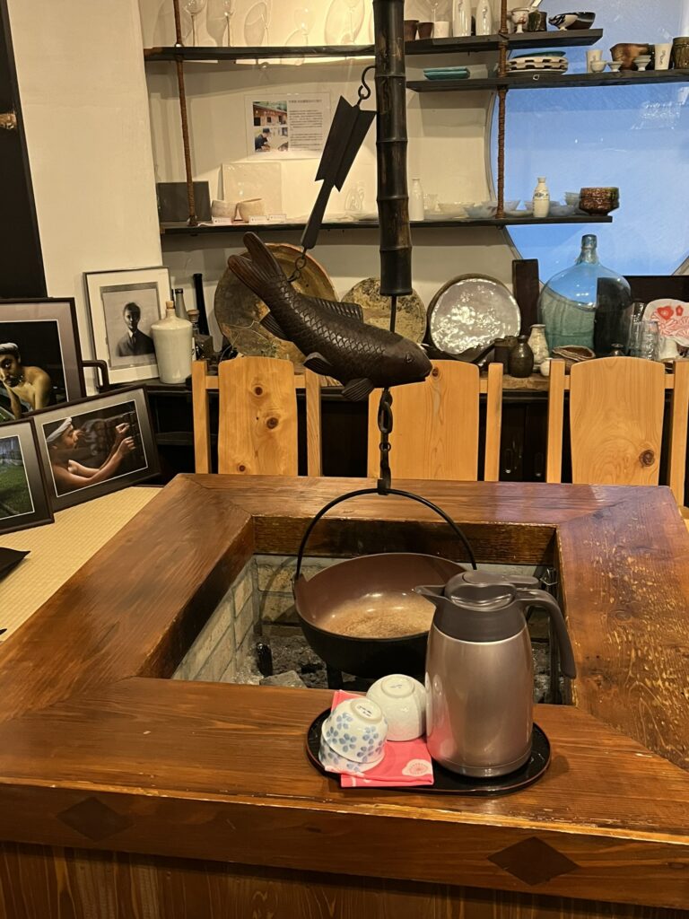 a warming fire in the Yamanaka Sake-no-Mise sake shop in Osaka Japan