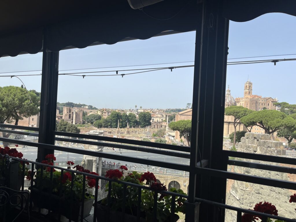 the view of the ancient Roman Forum from the Ristorante Rooftop Garden Restaurant at the Hotel Forum in Rome Italy