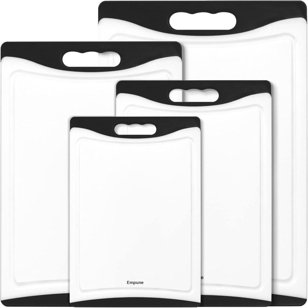four different sizes of plastic cutting boards