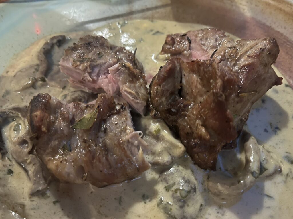 a plate of grilled Iberico pluma pork