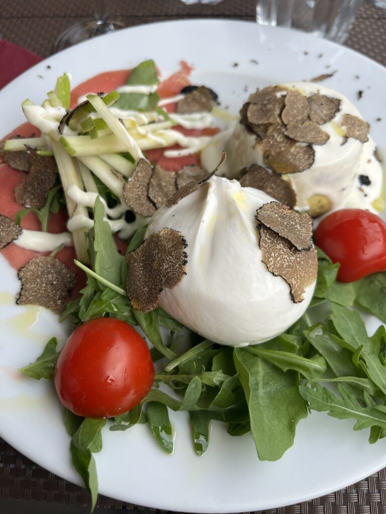 burrata with arugula and truffles