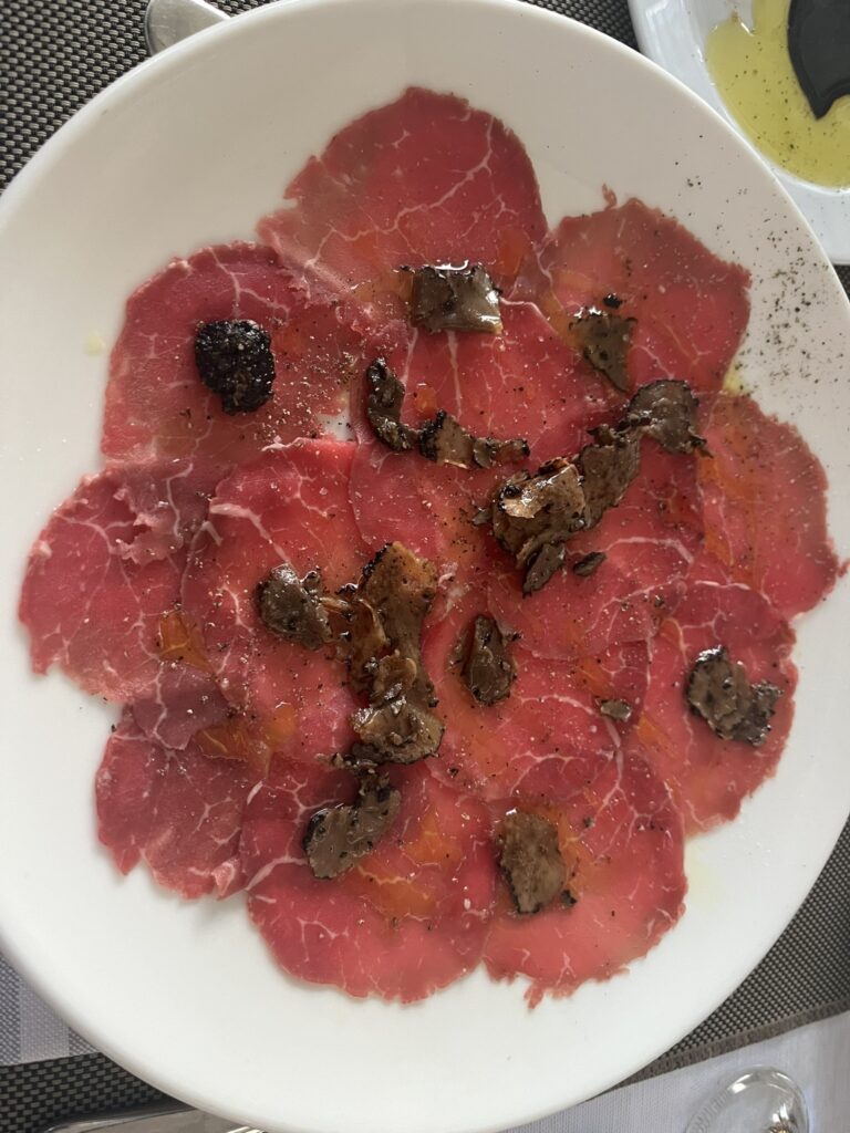 beef carpaccio with sliced truffles
