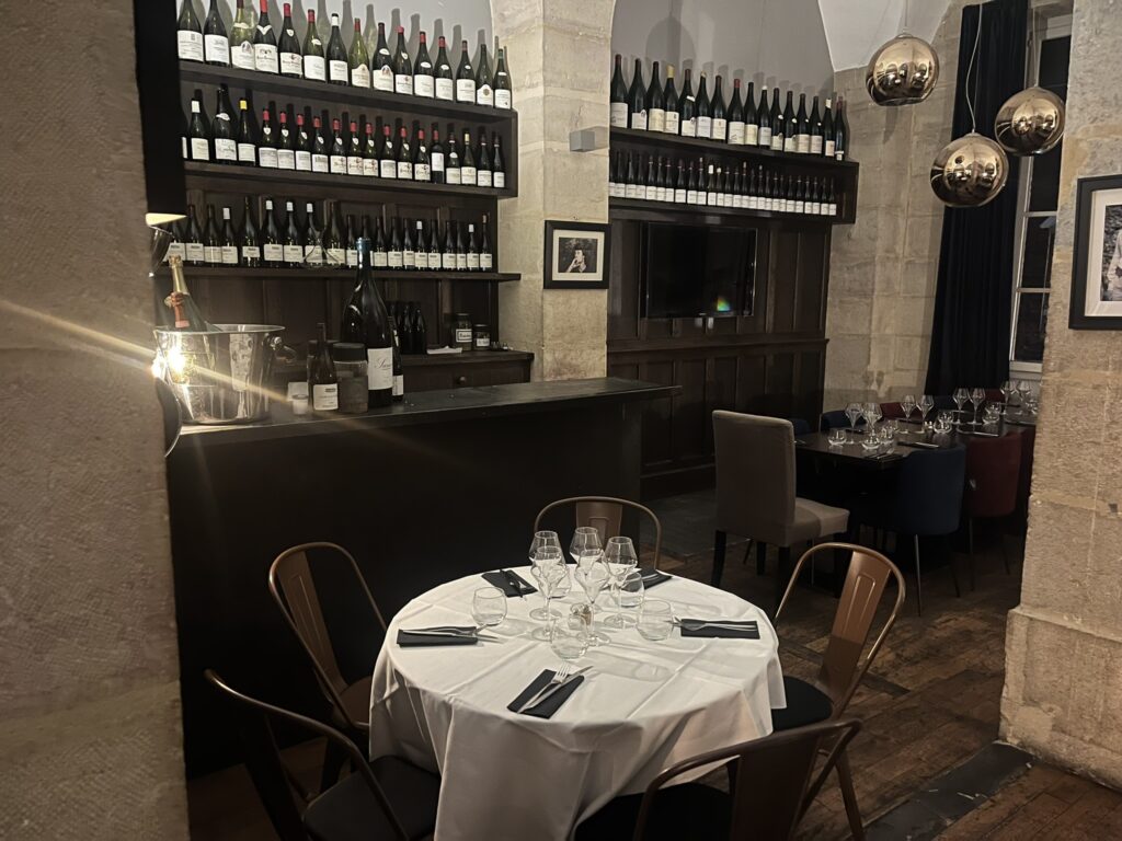 wine bottles and table in Dr. Wine restaurant in Dijon France