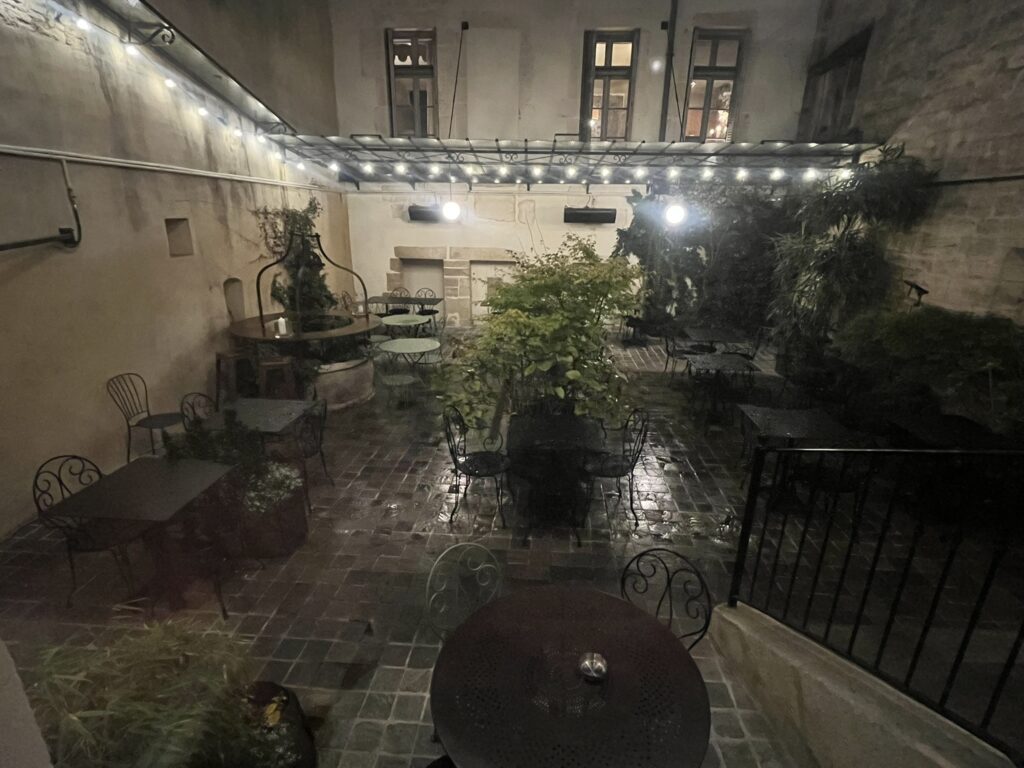 outdoor patio in the rain at Dr. Wine restaurant in Dijon France