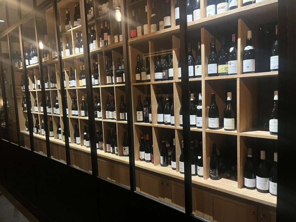 wall of wine bottles in Dr. Wine restaurant in Dijon France