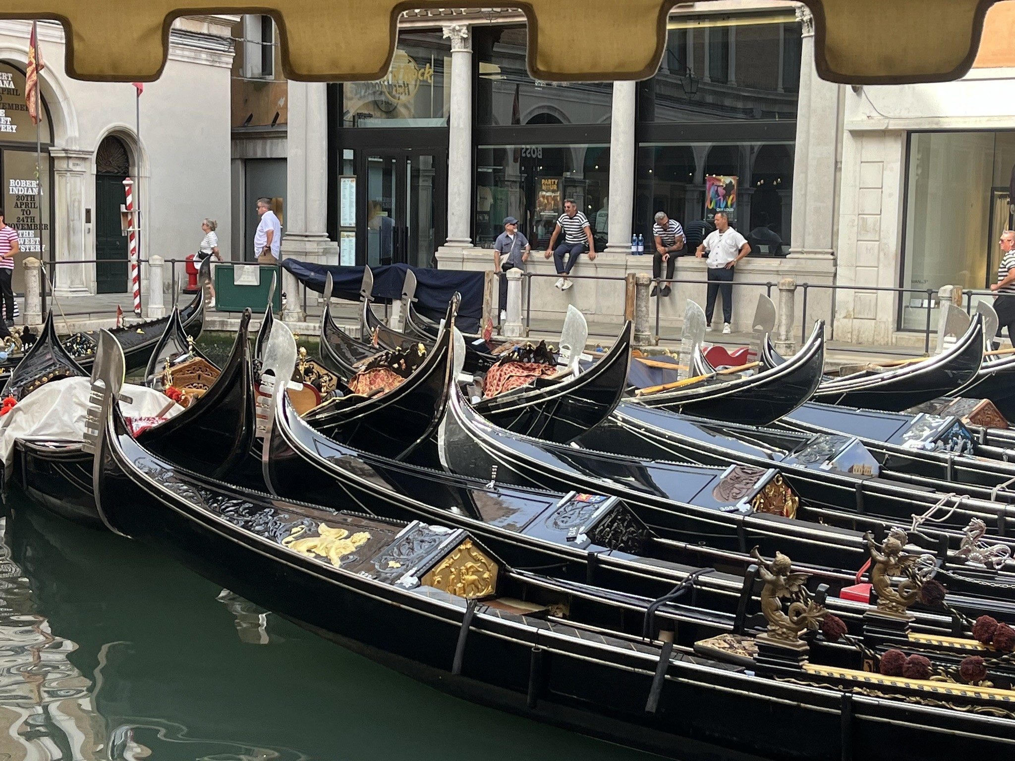a large number of Venetian gondolas gathered together