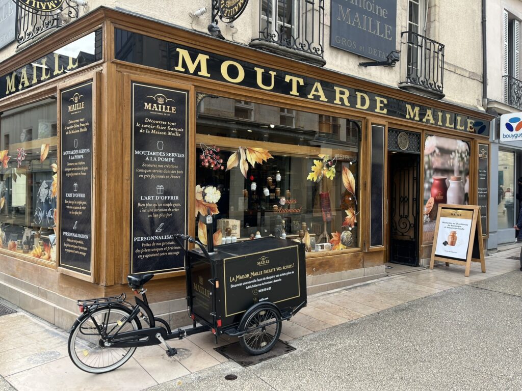 Moutarde Maille shop exterior with bicycle cart
