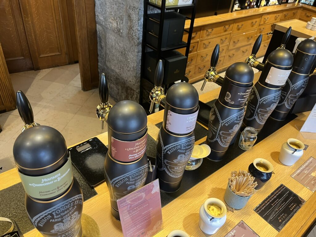 mustard on tap at the Moutarde Maille shop in Dijon France