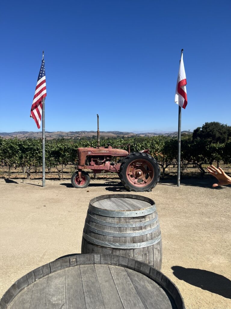 tractor, flags, and vineyard at Vega Vineyard and Farm Santa Barbara California