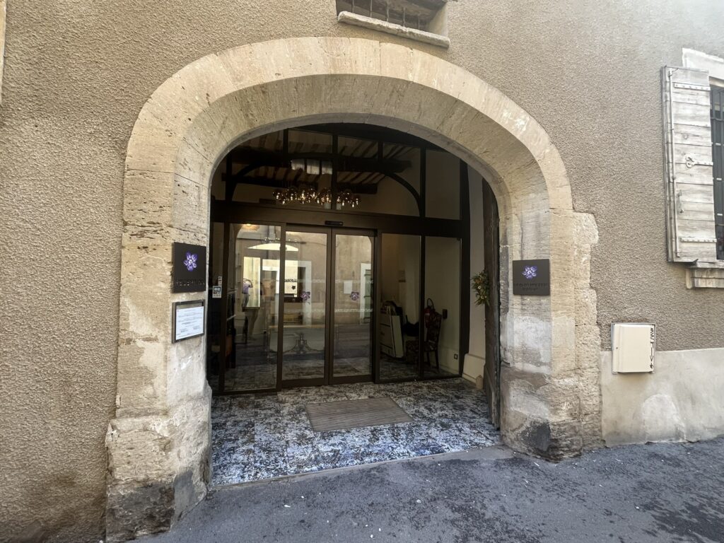 entrance to Le Clos Violette hotel in L'Isle-sur-la-Sorgue, France