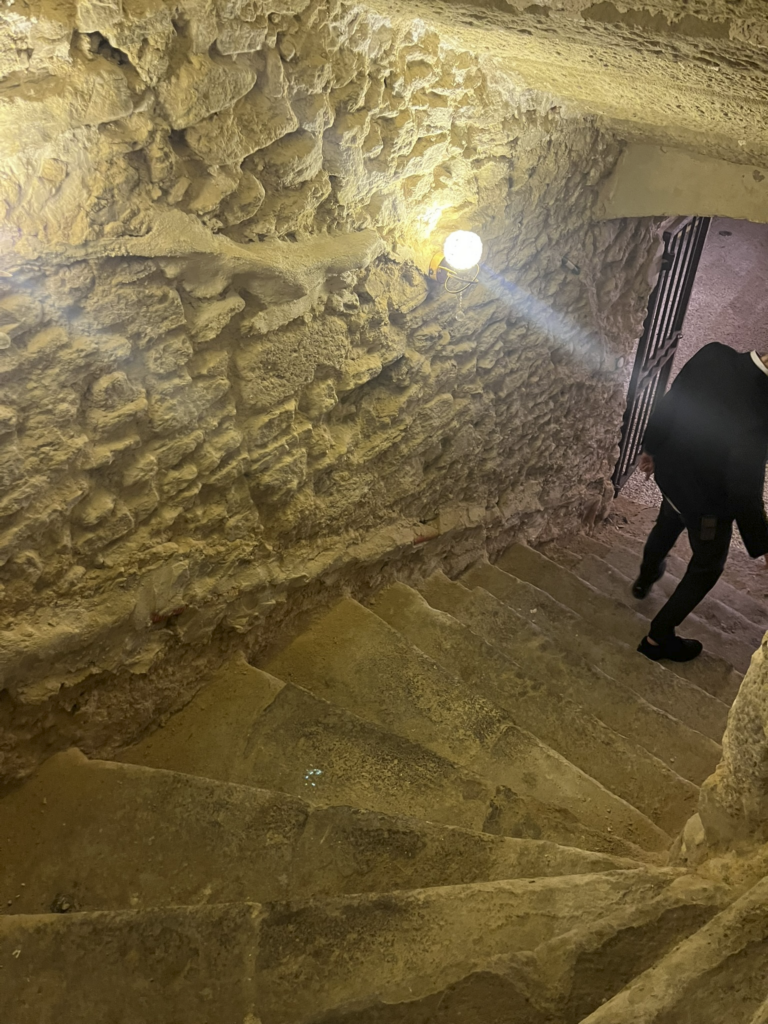 stairway to wine room at Le Clos Violette hotel in L'Isle-sur-la-Sorgue, France