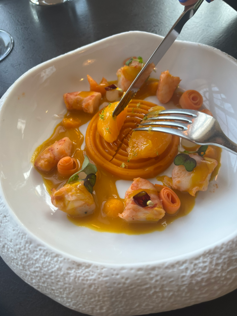 Marinated prawns with carrot sauce and egg yolk confit at Bulle - Restaurant de Fourvière Lyon France
