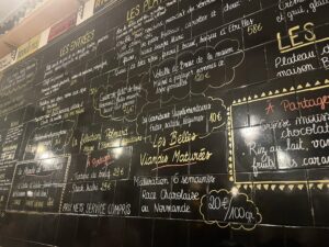 a menu board in a Paris bistro