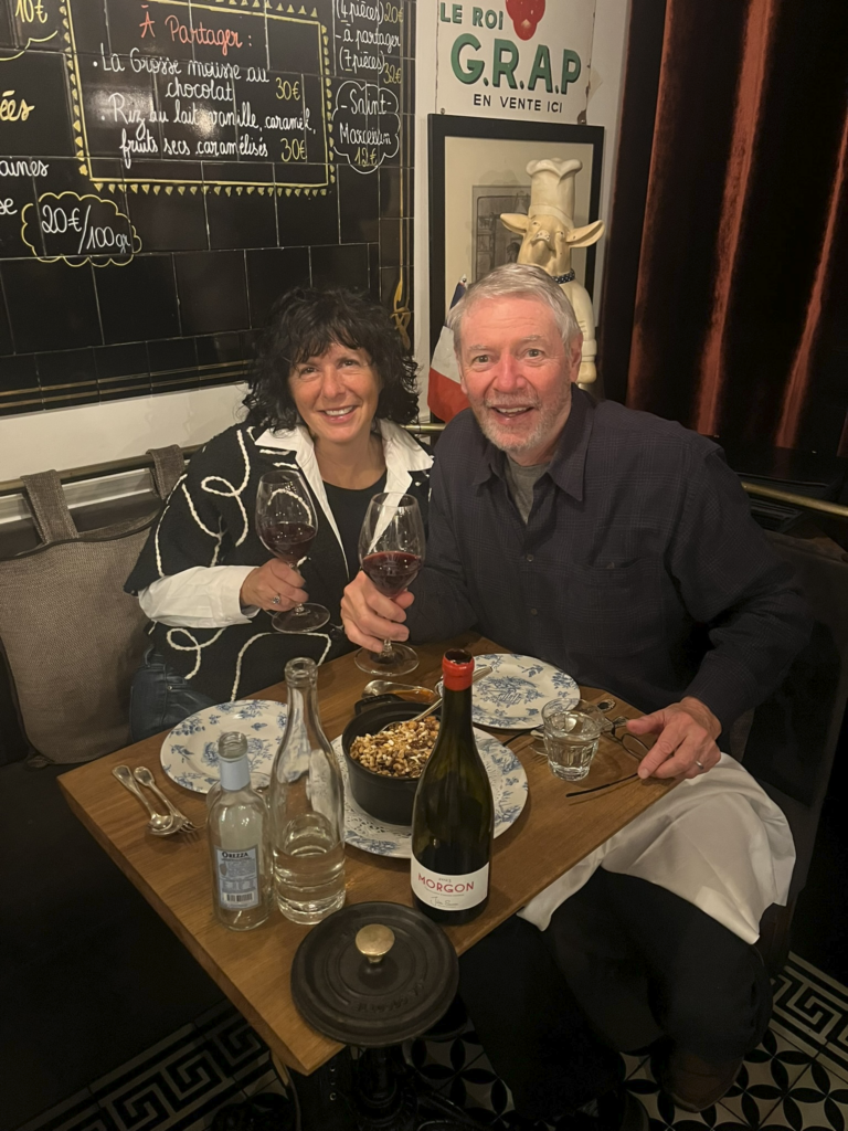 John Hornick and Sarah Alexander eating rice pudding at Le Bon Georges restaurant Paris France