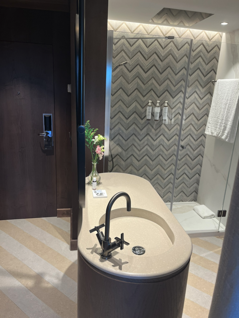 Bathroom area of suite at AC Hotel Malaga Palacio in Malaga Spain