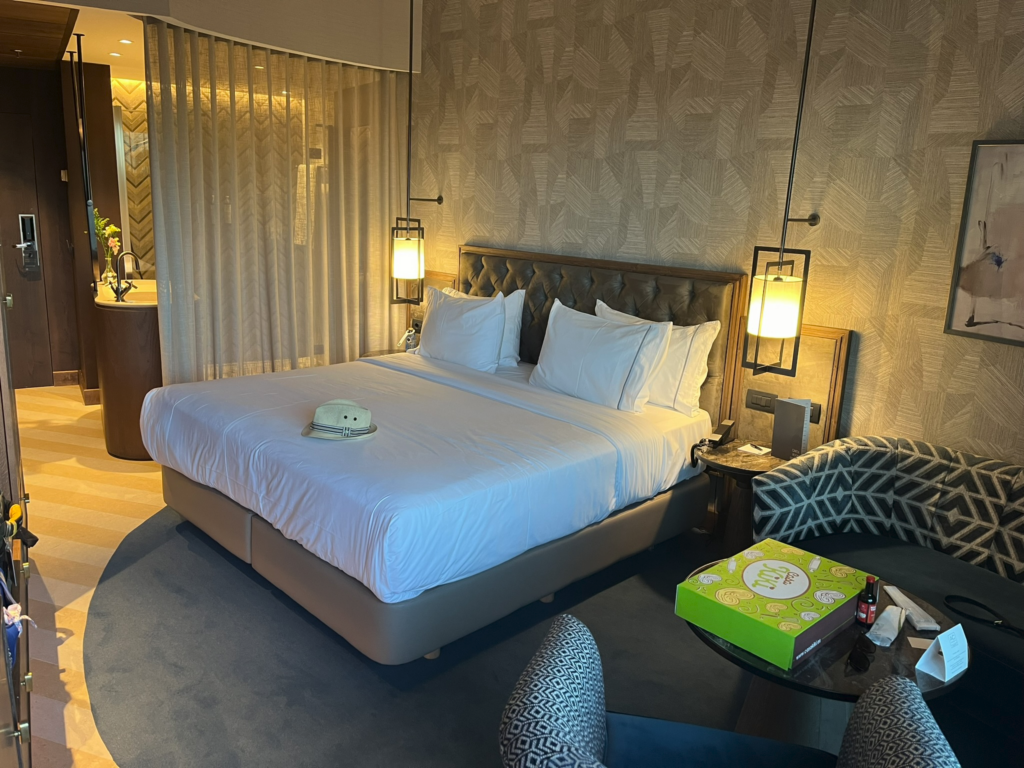Bedroom of suite at AC Hotel Malaga Palacio in Malaga Spain