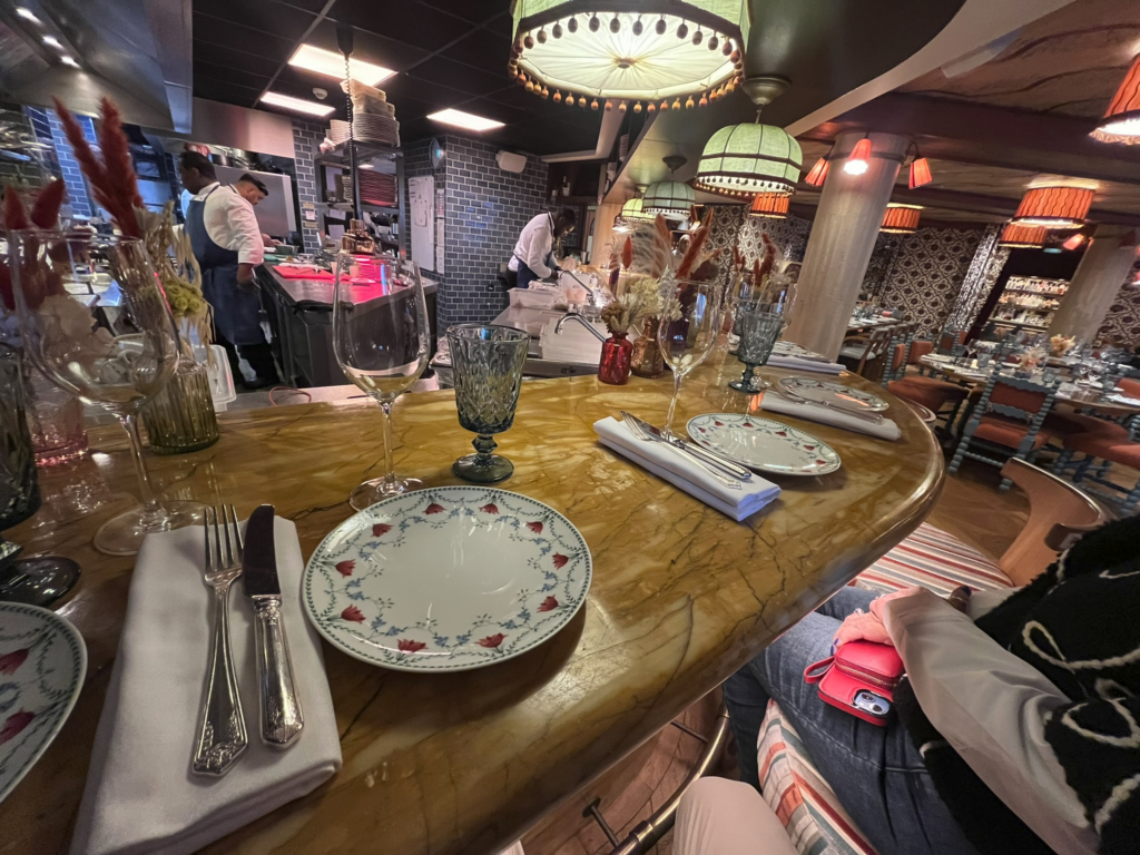view of bar and open kitchen of the Boubalé restaurant in Paris France