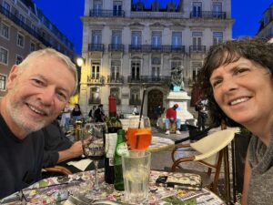 John Hornick & Sarah Alexander toasting at A BRASILEIRA in Lisbon, Portugal