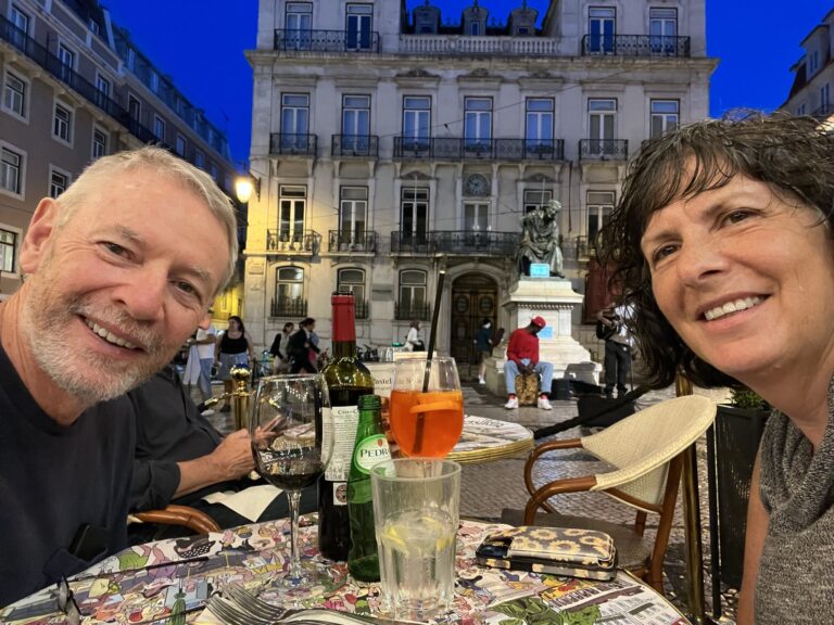 John Hornick & Sarah Alexander toasting at A BRASILEIRA in Lisbon, Portugal